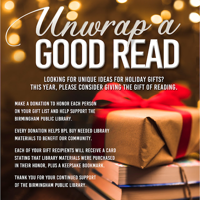 A graphic with a wrapped present in a red bow detailing the holiday donation campaign "Unwrap A Good Read."