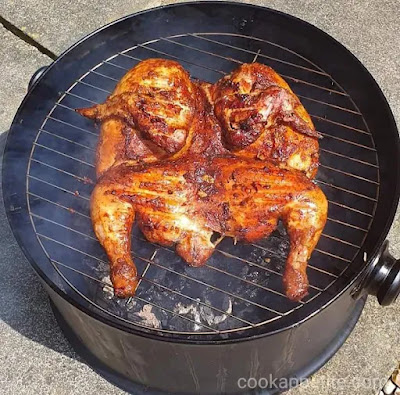 Smoke the chicken at  225 degrees for about  5 hours. You will need to manage your temperature to ensure the smoker doesn’t get too hot.   Breasts should be at 160°F and thighs should be at 170°F. You check the temperature by inserting the thermometer on breast and thighs.