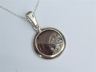 Silver circular pendant for hair or ashes