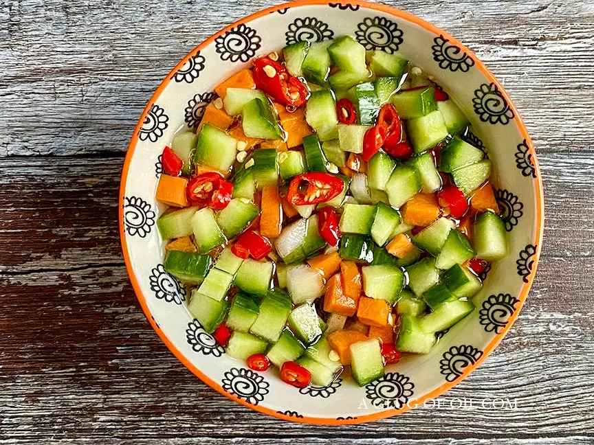 Thai sweet and sour dipping sauce in a small bowl.