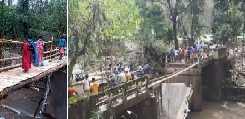 evabharati workers rebuild a bridge that collapsed due to rains