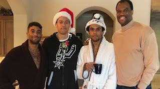 Picture of David Robinson with his 3 sons