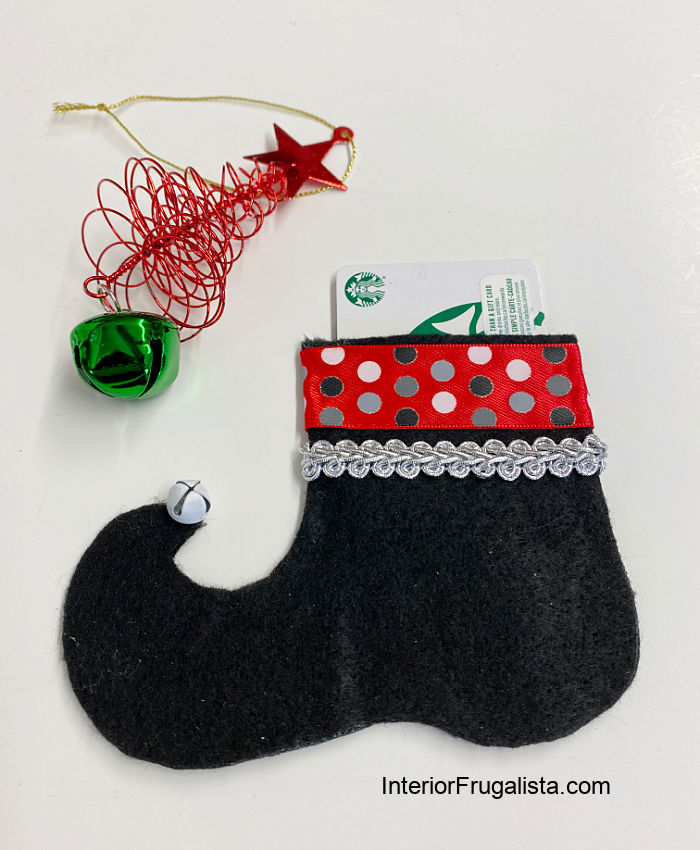 Black handmade felt elf shoe gift card holder for the holidays.