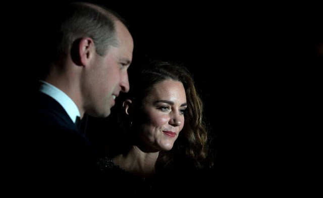 Kate Middleton wore a green gown by Jenny Packham. ​Emmy London pumps and Missoma London earrings