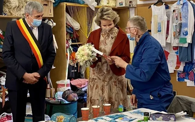 Queen Mathilde wore a floral print dress from Zimmermann. Mathilde wore a print dress from Etro. Natan floral dress