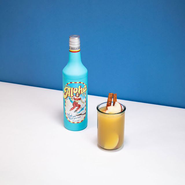 Mulled matata cocktail with Aloha 65 bottle