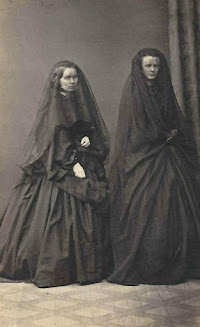 Victorian women might be in mourning for two years, wearing deep black crepe and long veils...
