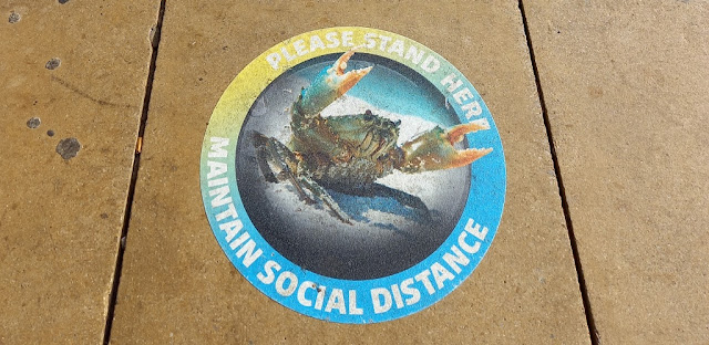 Social distancing sign at the SEA LIFE centre in Blackpool