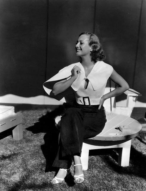 1933. Joan Crawford photographed by Clarence Sinclair Bull at home