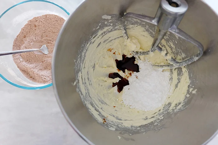 creaming butter and adding powdered sugar