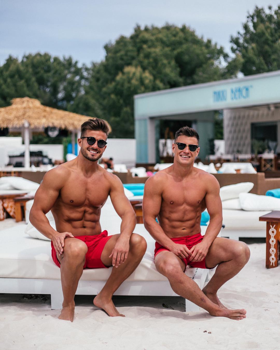 sexy-shirtless-fit-baywatch-male-lifeguards-buddies-smile