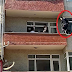 Balkondan balkona atlayan itfaiye eri, intihara kalkışan şahsı kurtardı