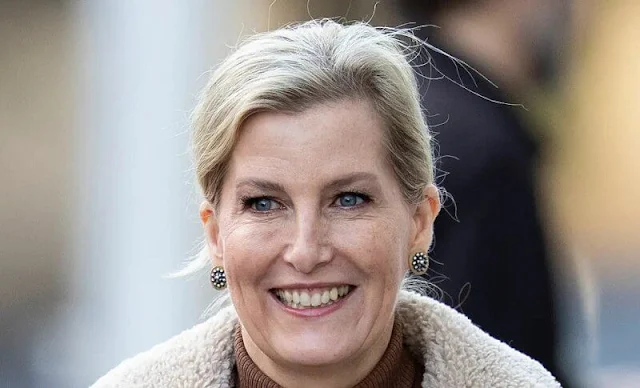 The Countess wore a new reversible double faced jacket by Indi & Cold, and a brown turtle-neck sweater from Suzannah