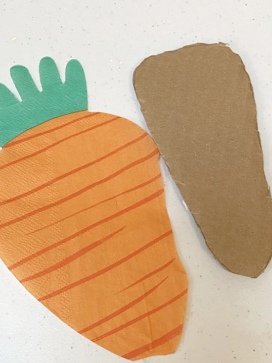 cardboard carrot cut out and napkin