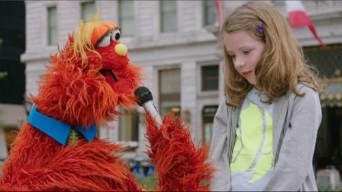 Sesame Street Episode 4503. Murray gives a report, he is in a Sesame Street News Flash.