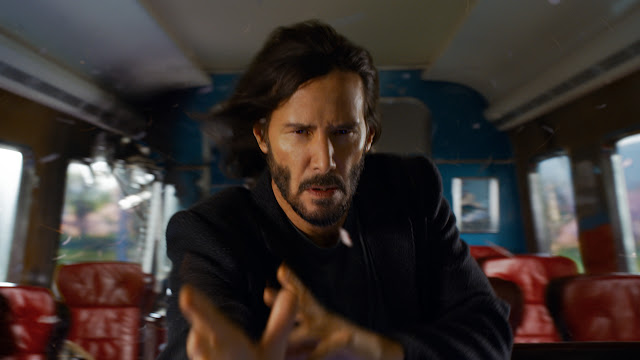 keanu reeves on a train