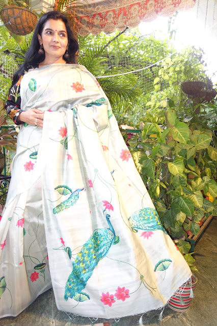 Digital print saree with peacocks and lotus on silk.