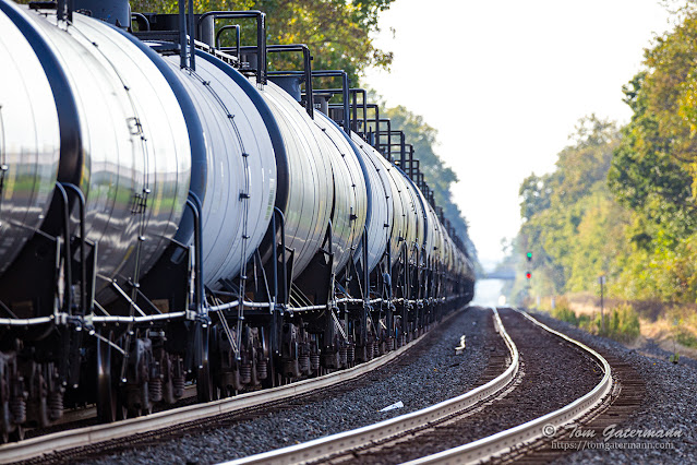 Tank cars on K622-29 stretch into the distance on the Rochester Subdivision