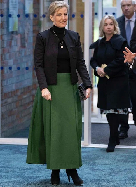 The Countess of Wessex wore green high-waisted pleated midi skirt from  Alberta Ferretti. The Countess wore a roll neck black blazer