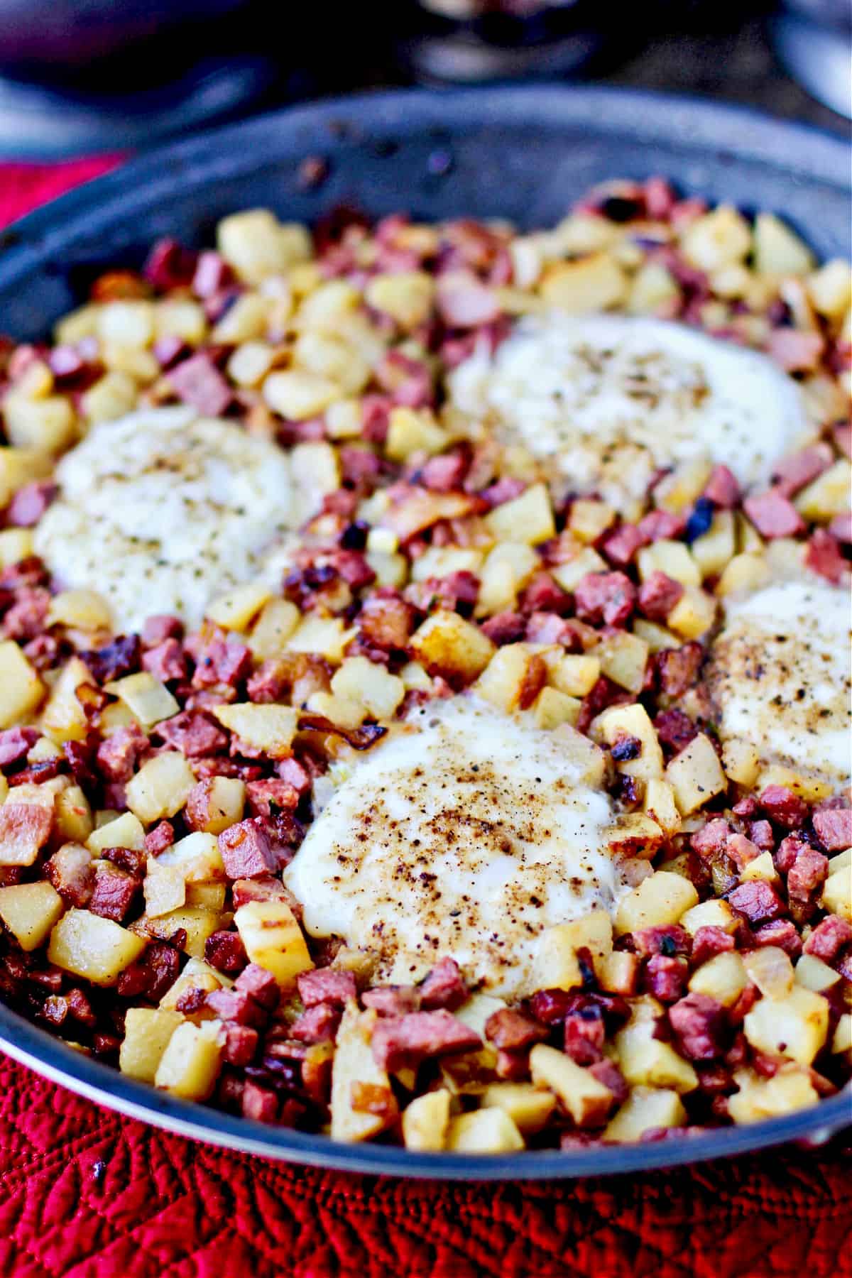 Corned Beef Hash with Yukon Gold Potatoes and Chiles in the pan.