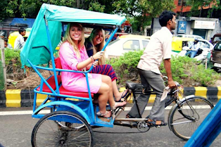 Enjoy a rickshaw ride through the streets of Delhi:
