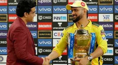 M S Dhoni With His 4th IPL Trophy . BCCI Head Saurav Ganguly handing over the trophy to Dhoni.