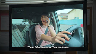 Screenshot from I Think You Should Leave, depicting Patti Harrison in a car and the text, "These tables are how I buy my house."