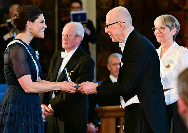 Crown Princess Victoria wore a tulle-ball dress from H&M Conscious Exclusive. Professor Marie-Louise Nosch