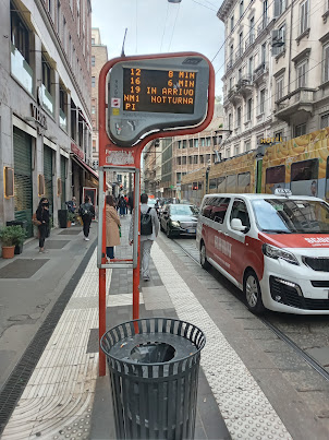 A glimpse of the narrow tram line roads of Milan .