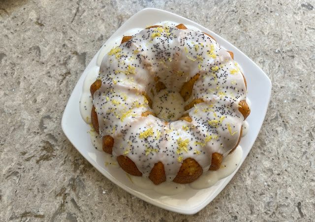 Food Lust People Love: Rich, tender and oh, so flavorful, this lemon poppy seed ricotta cake is speckled, with seeds but also tiny dots of the soft white ricotta cheese. The tart lemon glaze with the sprinkle of zest and more poppy seeds is a tasty addition.