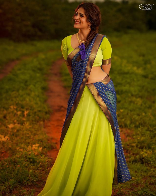 Shraddha Das is A Captivating Kaleidoscope in Bright Green and Blue Half Saree