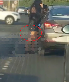 شاهد .. سيدة بملابس قصيرة بدولة عربية تحاول منع زوجها من المجادلة مع سائق مركبة أخرى