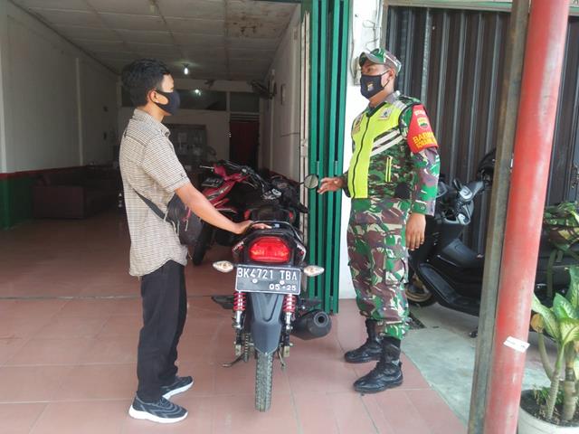 Berikan Himbauan Kepada Masyarakat Tetap Pakai Masker Dilakukan Personel Jajaran Kodim 0207/Simalungun