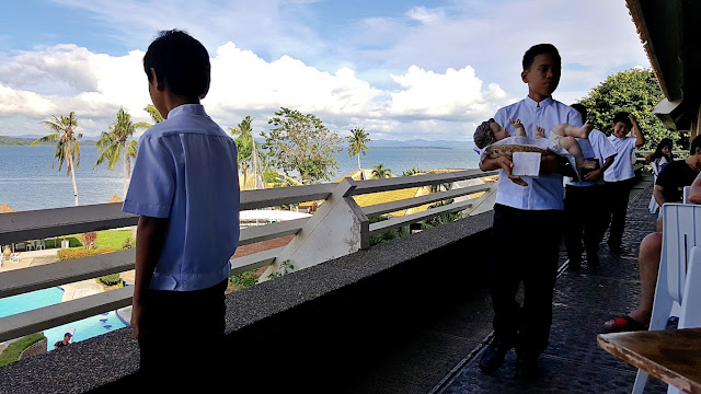 "Pahalik" boys rounding the Veranda Restaurant of Leyte Park Hotel