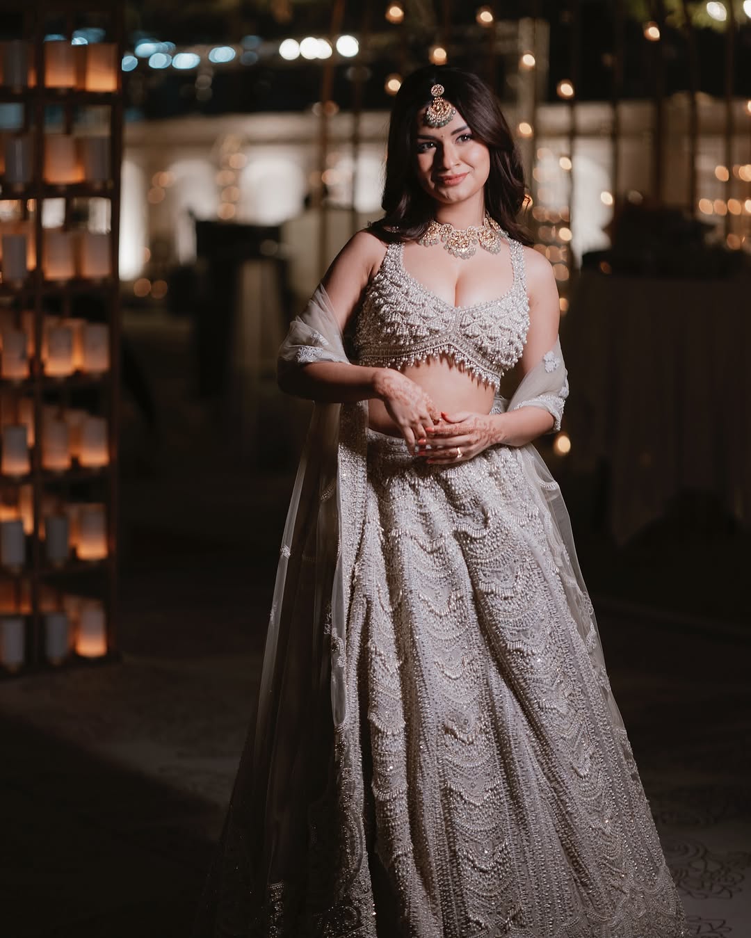Avneet Kaur Flaunts Her Deep, Shiny Cleavage in a Cream Lehenga