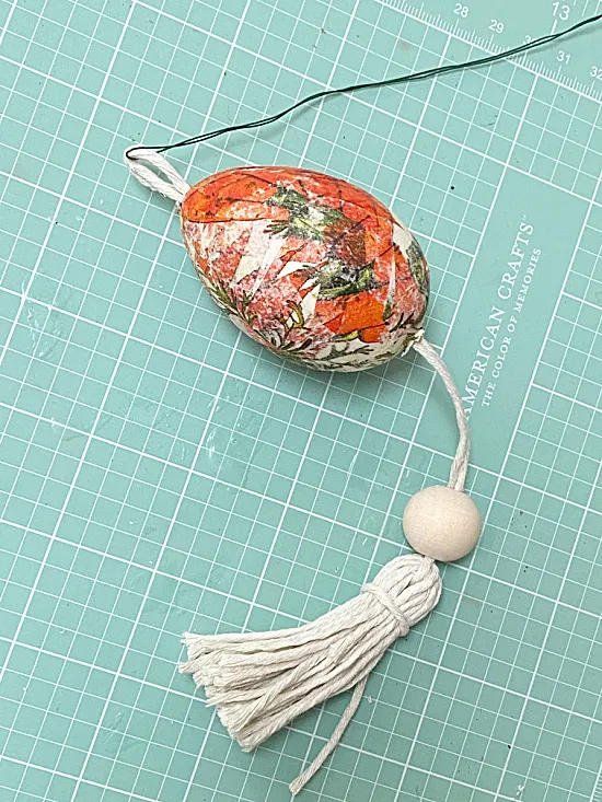 egg with tassel, bead and wired needle