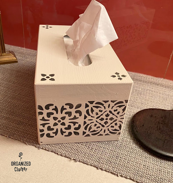 Photo of a painted and stenciled wooden tissue box holder from Hobby Lobby.