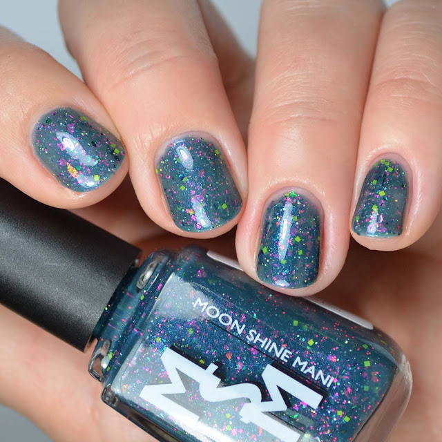 teal nail polish with glitter swatch