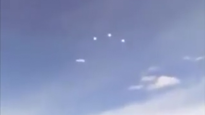 Disk been followed by 3 UFO Orbs over Chile.