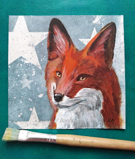 A fox painted in acrylics on a blue background with stars, 15 cm by 15 cm.