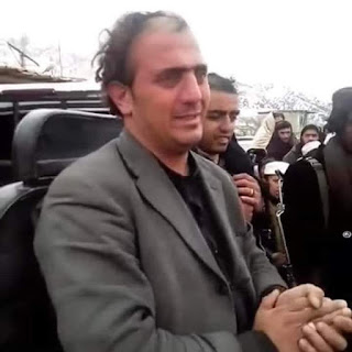 Local Afghan Singer With Tears In his Eyes Looking At The Music Instruments Taliban Burning. January 2022