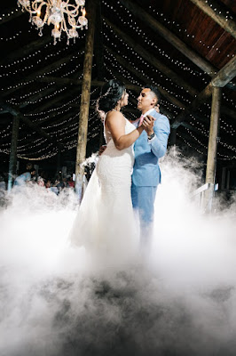 bride and groom dancing on a cloud