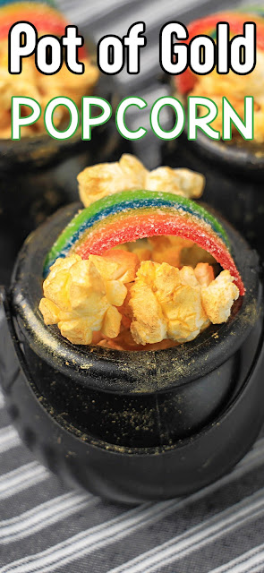 cauldron with gold popcorn and a candy rainbow with text overlay.