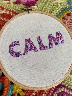 Mini embroidery hoop project with the word calm