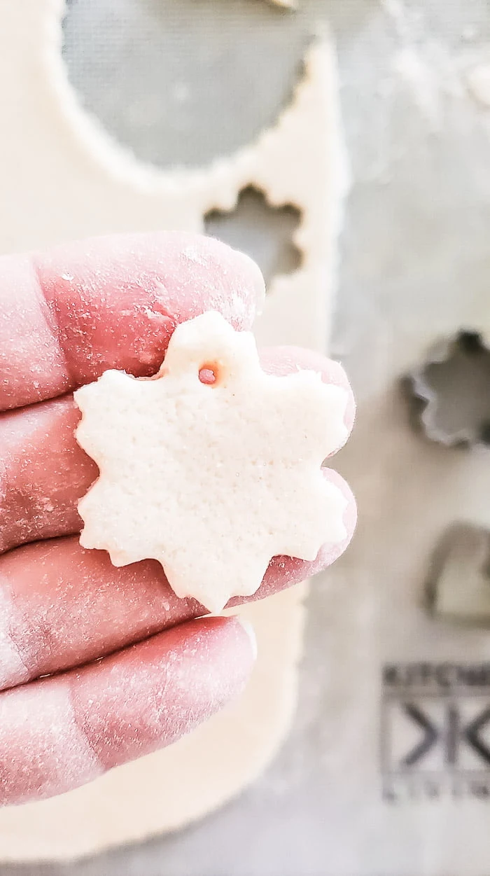 cutting out shapes of salt dough