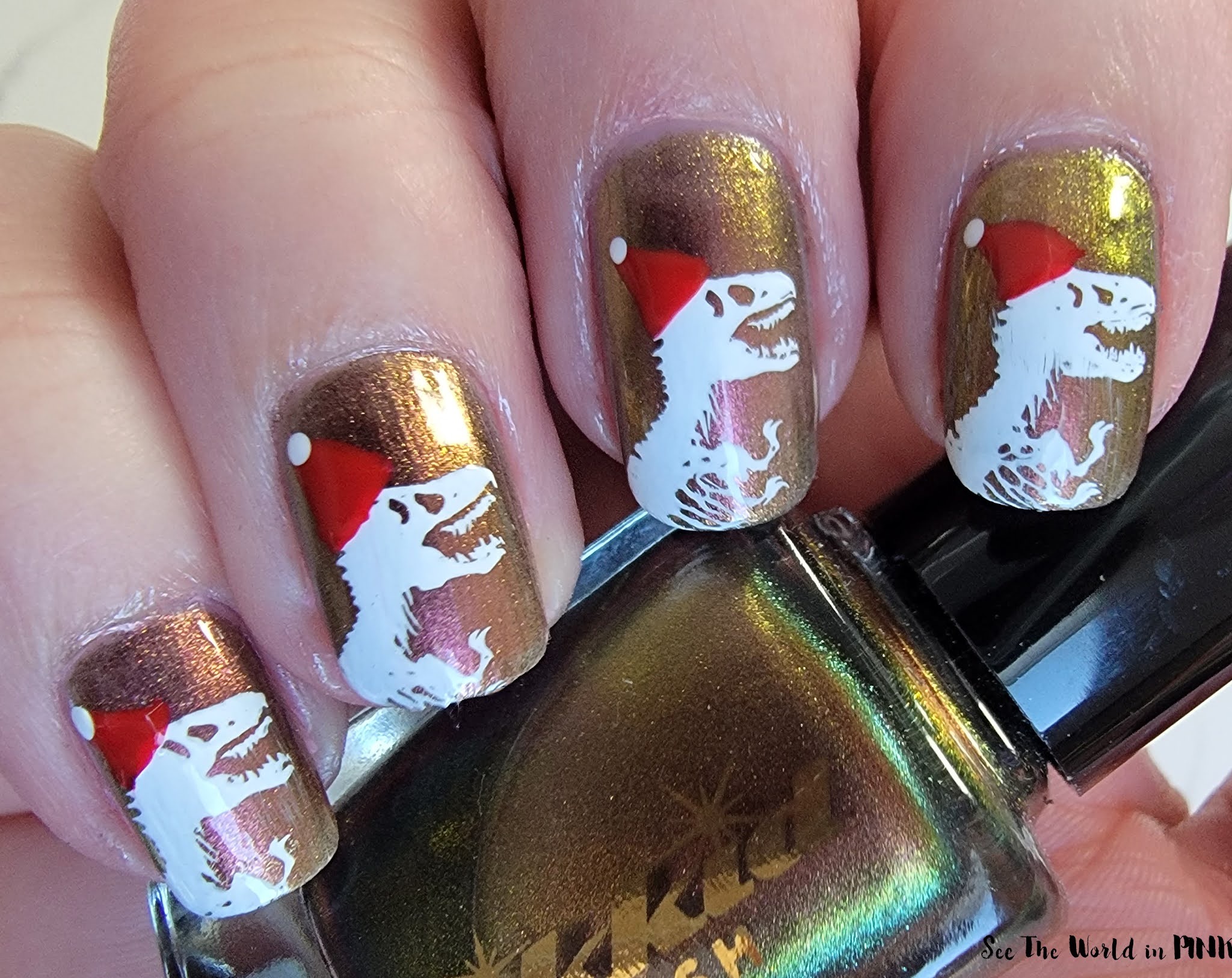 Manicure Monday - Dinosaur Santa Nails
