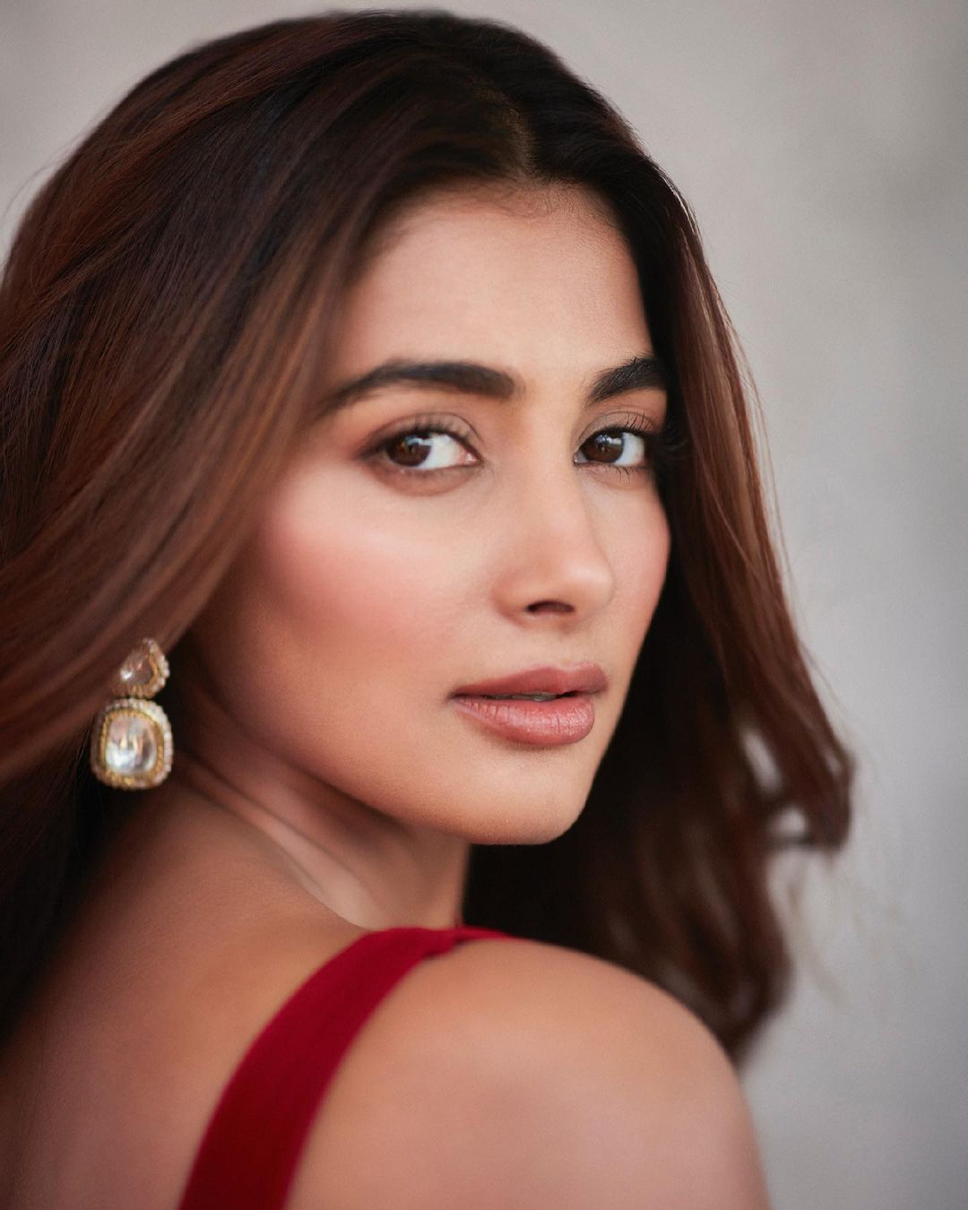 Bollywood Actress Pooja Hegde dazzles in a red ruffle saree worth ₹55k