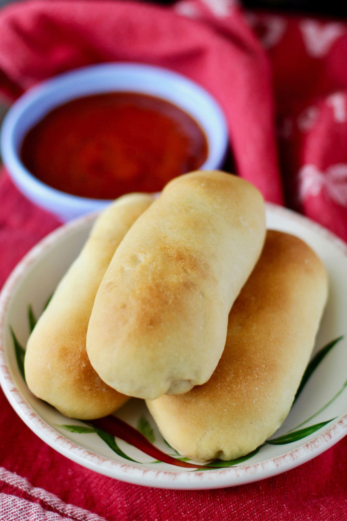 Pepperoni rolls with dipping sauce.