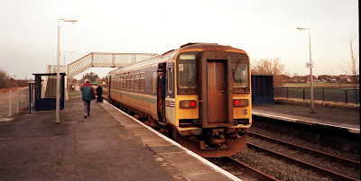 A  passenger train pictured while calling at Brigg railway station in December 1997