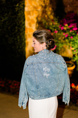 bride wearing jean jacket